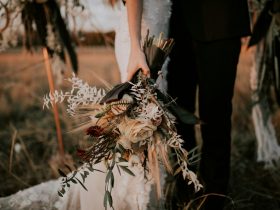 woman holding flower bouquet