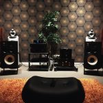 black and silver speakers on white table