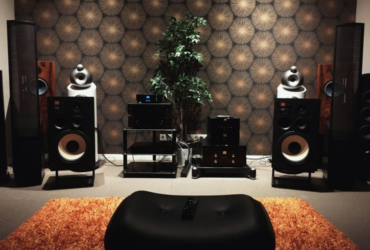 black and silver speakers on white table