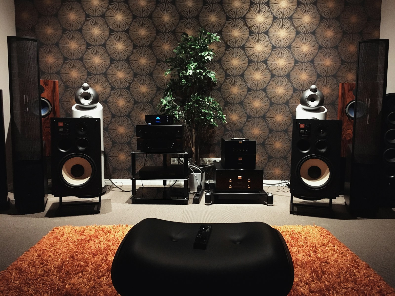 black and silver speakers on white table